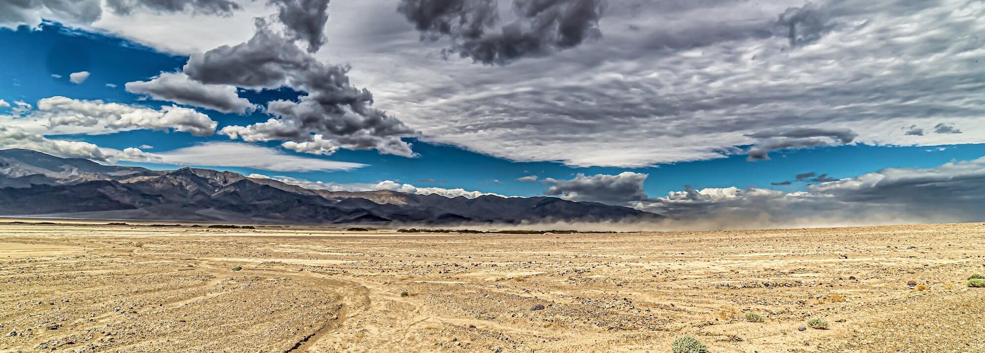 Dry land with clouds above